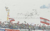 Spectators in finish in snow storm during second run of men giant slalom race of Audi FIS Alpine skiing World cup 2012-2013 in Soelden, Austria. First men giant slalom race of Audi FIS Alpine skiing World cup was held on Rettenbach glacier above Soelden, Austria, on Sunday, 28th of October 2012.
