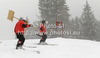 Course workers preparing course in heavy snow before start of men downhill race of Audi FIS Alpine skiing World cup 2012-2013 in Val Gardena, Italy. Man downhill race of Audi FIS Alpine skiing World cup was held on Saslong course in Val Gardena, Italy, on Saturday, 15th of December 2012.
