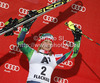Third placed Tanja Poutiainen of Finland celebrates her medal won in women night slalom race of Audi FIS Alpine skiing World cup 2012-2013 in Flachau, Austria. Women night slalom race of Audi FIS Alpine skiing World cup was held Flachau, Austria, on Tuesday, 15th of January 2013.
