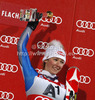 Winner Mikaela Shiffrin of USA celebrates her medal won in women night slalom race of Audi FIS Alpine skiing World cup 2012-2013 in Flachau, Austria. Women night slalom race of Audi FIS Alpine skiing World cup was held Flachau, Austria, on Tuesday, 15th of January 2013.
