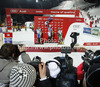 Winner Mikaela Shiffrin of USA (M), second placed Frida Hansdotter of Sweden (L) and third placed Tanja Poutiainen of Finland (R) celebrate their medals won in women night slalom race of Audi FIS Alpine skiing World cup 2012-2013 in Flachau, Austria, while posing for photographers. Women night slalom race of Audi FIS Alpine skiing World cup was held Flachau, Austria, on Tuesday, 15th of January 2013.
