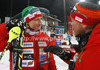 Third placed Tanja Poutiainen of Finland (L) discussing race with her coach Christian Bruesch after placing third in women night slalom race of Audi FIS Alpine skiing World cup 2012-2013 in Flachau, Austria. Women night slalom race of Audi FIS Alpine skiing World cup was held Flachau, Austria, on Tuesday, 15th of January 2013.
