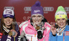 Winner and new super combined World Champion Maria Hoefl-Riesch of Germany (M), second placed Tina Maze of Slovenia (L) and third placed Nicole Hosp of Austria (R) celebrate their medals won in women super combined race of FIS Alpine skiing World Championships in Schladming, Austria. Women super combined race of FIS Alpine skiing World championships Schladming 2013, was held in Schladming, Austria, on Friday, 8th of February 2013.
