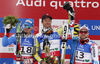 Winner and new downhill World champion Aksel Lund Svindal of Norway (M), second placed Dominik Paris of Italy (L) and third placed David Poisson of France (R) celebrate their medals won in men downhill race of FIS Alpine skiing World Championships in Schladming, Austria. Men downhill race of FIS Alpine skiing World championships Schladming 2013, was held in Schladming, Austria, on Saturday, 9th of February 2013.
