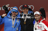 Winner and new downhill World Champion Aksel Lund Svindal of Norway (M), second placed Dominik Paris of Italy (L) and third placed David Poisson of France (R) celebrate their medals won in men downhill race of FIS Alpine skiing World Championships in Schladming, Austria. Men downhill race of FIS Alpine skiing World championships Schladming 2013, was held in Schladming, Austria, on Saturday, 9th of February 2013.

