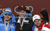 Winner and new downhill World Champion Aksel Lund Svindal of Norway (M), second placed Dominik Paris of Italy (L) and third placed David Poisson of France (R) celebrate their medals won in men downhill race of FIS Alpine skiing World Championships in Schladming, Austria. Men downhill race of FIS Alpine skiing World championships Schladming 2013, was held in Schladming, Austria, on Saturday, 9th of February 2013.
