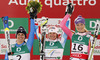 Winner and new women downhill World Champion Marion Rolland of France (M), second placed Nadia Fanchini of Italy (L) and third placed Maria Hoefl-Riesch of Germany (R) celebrate their medals won in women downhill race of FIS Alpine skiing World Championships in Schladming, Austria. Women downhill race of FIS Alpine skiing World championships Schladming 2013, was held in Schladming, Austria, on Sunday, 10th of February 2013.
