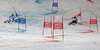 Felix Neureuther of Germany (L) and Michael Janyk of Canada (R) skiing in Nations team event of FIS Alpine skiing World Championships in Schladming, Austria. Nations team event of FIS Alpine skiing World championships Schladming 2013, was held in Schladming, Austria, on Tuesday, 12th of February 2013.
