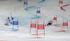 Maria Hoefl-Riesch of Germany (L) and Erin Mielzynski of Canada (R) skiing in Nations team event of FIS Alpine skiing World Championships in Schladming, Austria. Nations team event of FIS Alpine skiing World championships Schladming 2013, was held in Schladming, Austria, on Tuesday, 12th of February 2013.
