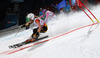Maria Hoefl-Riesch of Germany (R) and Erin Mielzynski of Canada (L) skiing in Nations team event of FIS Alpine skiing World Championships in Schladming, Austria. Nations team event of FIS Alpine skiing World championships Schladming 2013, was held in Schladming, Austria, on Tuesday, 12th of February 2013.
