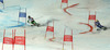 Eemeli Pirinen of Finland (L) and Andre Myhrer of Sweden (R) skiing in team event race of FIS Alpine skiing World Championships in Schladming, Austria. Slalom of men super combined race of FIS Alpine skiing World championships Schladming 2013, was held in Schladming, Austria, on Tuesday, 12th of February 2013.
