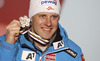 Third placed Romed Baumann of Austria celebrates his medal won in men super combined race of FIS Alpine skiing World Championships in Schladming, Austria. Men super combined race of FIS Alpine skiing World championships Schladming 2013, was held in Schladming, Austria, on Monday, 11th of February 2013.
