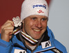 Third placed Romed Baumann of Austria celebrates his medal won in men super combined race of FIS Alpine skiing World Championships in Schladming, Austria. Men super combined race of FIS Alpine skiing World championships Schladming 2013, was held in Schladming, Austria, on Monday, 11th of February 2013.
