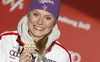 Winner and new women giant slalom World Champion Tessa Worley of France celebrates her medal won in women giant slalom race of FIS Alpine skiing World Championships in Schladming, Austria. Women giant slalom race of FIS Alpine skiing World championships Schladming 2013, was held in Schladming, Austria, on Thursday, 14th of February 2013.
