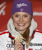 Winner and new women giant slalom World Champion Tessa Worley of France celebrates her medal won in women giant slalom race of FIS Alpine skiing World Championships in Schladming, Austria. Women giant slalom race of FIS Alpine skiing World championships Schladming 2013, was held in Schladming, Austria, on Thursday, 14th of February 2013.
