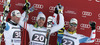 Winner Christof Innerhofer of Italy (M), second placed Georg Streitberger of Austria (L) and third placed Klaus Kroell of Austria (R) celebrate their medals won in men downhill race of FIS Alpine skiing World Cup in Garmisch-Partenkirchen, Germany. Men downhill race of FIS Alpine skiing World Cup in Garmisch-Partenkirchen, Germany, was held on Saturday, 23rd of February 2013.
