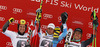 Winner Alexis Pinturault of France (M), second placed Marcel Hirscher of Austria (L) and third placed Ted Ligety of USA (R) celebrate their medals won in men giant slalom race of FIS Alpine skiing World Cup in Garmisch-Partenkirchen, Germany. Men giant slalom race of FIS Alpine skiing World Cup in Garmisch-Partenkirchen, Germany, was held on Sunday, 24th of February 2013.
