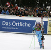 Second placed Tina Maze of Slovenia waiting for last racer to come to finish during second run of women giant slalom race of FIS Alpine skiing World Cup in Ofterschwang, Germany. Women giant slalom race of FIS Alpine skiing World Cup in Ofterschwang, Germany, was held on Saturday, 9th of March 2013.
