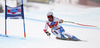 Didier Defago of Switzerland skiing during men Super-G race of Audi FIS Alpine skiing World cup in Val Gardena, Italy. Super-G race of Audi FIS Alpine skiing World cup 2013-2014 was held on Friday, 20th of December 2013 on Saslong course in Val Gardena, Italy.
