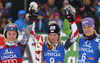 Winner Marlies Schild of Austria (M), second placed Mikaela Shiffrin of USA (L) and third placed Maria Hoefl-Riesch of Germany (R) celebrate their medals won in women slalom race of Audi FIS Alpine skiing World cup in Lienz, Austria. Women slalom race of Audi FIS Alpine skiing World cup 2013-2014 was held on Sunday, 29th of December 2013 in Lienz, Austria.
