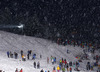 Spectators in snowstorm during second run of men slalom race of Audi FIS Alpine skiing World cup in Kitzbuehel, Austria. Men slalom race of Audi FIS Alpine skiing World cup 2013-2014 was held on Friday, 24th of January 2014 in Kitzbuehel, Austria.
