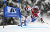 Winner Didier Defago of Switzerland skiing in men super-g race of Audi FIS Alpine skiing World cup in Kitzbuehel, Austria. Men super-g race of Audi FIS Alpine skiing World cup 2013-2014 was held on Sunday, 26th of January 2014 on Streifalm course in Kitzbuehel, Austria.
