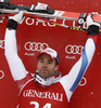 Winner Didier Defago of Switzerland celebrates his medal won in men super-g race of Audi FIS Alpine skiing World cup in Kitzbuehel, Austria. Men super-g race of Audi FIS Alpine skiing World cup 2013-2014 was held on Sunday, 26th of January 2014 on Streifalm course in Kitzbuehel, Austria.
