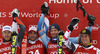 Winner Didier Defago of Switzerland (2nd from L), second placed Bode Miller of USA (L) and third placed Aksel Lund Svindal of Norway (2nd from R) and Max Franz of Austria (R) celebrate their medals won in men super-g race of Audi FIS Alpine skiing World cup in Kitzbuehel, Austria. Men super-g race of Audi FIS Alpine skiing World cup 2013-2014 was held on Sunday, 26th of January 2014 on Streifalm course in Kitzbuehel, Austria.
