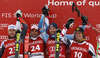 Winner Didier Defago of Switzerland (2nd from L), second placed Bode Miller of USA (L) and third placed Aksel Lund Svindal of Norway (2nd from R) and Max Franz of Austria (R) celebrate their medals won in men super-g race of Audi FIS Alpine skiing World cup in Kitzbuehel, Austria. Men super-g race of Audi FIS Alpine skiing World cup 2013-2014 was held on Sunday, 26th of January 2014 on Streifalm course in Kitzbuehel, Austria.

