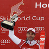 Winner Didier Defago of Switzerland celebrates his medal won in men super-g race of Audi FIS Alpine skiing World cup in Kitzbuehel, Austria. Men super-g race of Audi FIS Alpine skiing World cup 2013-2014 was held on Sunday, 26th of January 2014 on Streifalm course in Kitzbuehel, Austria.
