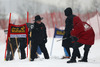 Workers on course trying to prepare course for the first run of 50th Golden Fox trophy women giant slalom race of Audi FIS Alpine skiing World cup in Kranjska Gora, Slovenia. 50th Golden Fox trophy women giant slalom race of Audi FIS Alpine skiing World cup 2013-2014 should be held on Saturday, 1st of February 2014 in Kranjska Gora, Slovenia, but was canceled due rainfall and too soft course.
