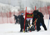 Workers on course trying to prepare course for the first run of 50th Golden Fox trophy women giant slalom race of Audi FIS Alpine skiing World cup in Kranjska Gora, Slovenia. 50th Golden Fox trophy women giant slalom race of Audi FIS Alpine skiing World cup 2013-2014 should be held on Saturday, 1st of February 2014 in Kranjska Gora, Slovenia, but was canceled due rainfall and too soft course.
