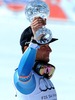 Aksel Lund Svindal with overall downhill World cup trophy during Mens Super G of FIS Ski Alpine World Cup at the Pista Silvano Beltrametti in Lenzerheide, Switzerland on 2014/03/13.
