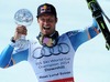 Aksel Lund Svindal with overall downhill World cup trophy during Mens Super G of FIS Ski Alpine World Cup at the Pista Silvano Beltrametti in Lenzerheide, Switzerland on 2014/03/13.
