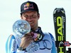 Aksel Lund Svindal with overall downhill World cup trophy during Mens Super G of FIS Ski Alpine World Cup at the Pista Silvano Beltrametti in Lenzerheide, Switzerland on 2014/03/13.
