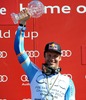 Aksel Lund Svindal with overall downhill World cup trophy during Mens Super G of FIS Ski Alpine World Cup at the Pista Silvano Beltrametti in Lenzerheide, Switzerland on 2014/03/13.
