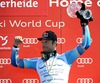 Aksel Lund Svindal with overall downhill World cup trophy during Mens Super G of FIS Ski Alpine World Cup at the Pista Silvano Beltrametti in Lenzerheide, Switzerland on 2014/03/13.

