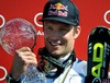 Aksel Lund Svindal with overall downhill World cup trophy during Mens Super G of FIS Ski Alpine World Cup at the Pista Silvano Beltrametti in Lenzerheide, Switzerland on 2014/03/13.
