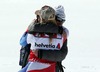 Lara Gut celebrates her victory with her father during Womens Super G of FIS Ski Alpine World Cup at the Pista Silvano Beltrametti in Lenzerheide, Switzerland on 2014/03/13.
