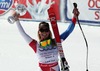 Lara Gut celebrates her super-g overall World cup victory after Womens Super G of FIS Ski Alpine World Cup at the Pista Silvano Beltrametti in Lenzerheide, Switzerland on 2014/03/13.
