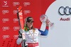 Lara Gut celebrates her super-g overall World cup victory after Womens Super G of FIS Ski Alpine World Cup at the Pista Silvano Beltrametti in Lenzerheide, Switzerland on 2014/03/13.
