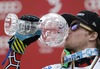 Ted Ligety (USA) with overall giant slalom crystal globe after mens Giant Slalom of FIS Ski Alpine World Cup finals at the Pista Silvano Beltrametti in Lenzerheide, Switzerland on 2014/03/15.
