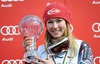 Mikaela Shiffrin (USA) celebrates her overall Slalom World cup victory with crystal globe after ladies Slalom of FIS Ski Alpine World Cup finals at the Pista Silvano Beltrametti in Lenzerheide, Switzerland on 2014/03/15.
