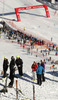 Coaches next to the course of the first run of men giant slalom race of Audi FIS Alpine skiing World cup in Soelden, Austria. First race of Audi FIS Alpine skiing World cup season 2014-2015, was held on Sunday, 26th of October 2014 on Rettenbach glacier above Soelden, Austria
