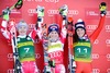 2nd placed Kathrin Zettel of Austria ( L ) 1st placed Eva-Maria Brem of Austria ( C ) 3rd placed Federica Brignone of Italy ( R ) during winner presentation after ladies Giant Slalom of FIS Ski Alpine Worldcup at the Aspen Mountain Course in Aspen, Canada on 2014/11/29. 
