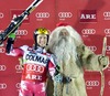 2nd placed Ted Ligety of the USA celebrates on podium with Santa Claus during winner presentation after men Giant Slalom of FIS Ski World Cup at Olympia Course in Are, Sweden on 2014/12/12.
