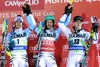 Second placed Fritz Dopfer of Germany, Winner Felix Neureuther of Germany anjd third placed Jens Byggmark of Sweden celebrates on Podium after men Madonna di Campiglio Slalom of the FIS Ski Alpine World Cup at the Canalone Miramonti in Madonna di Campiglio, Italy on 2014/12/22.

