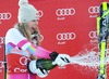 1st placed Lindsey Vonn of the USA Celebrate on Podium during the award ceremony for the ladies Downhill of the Cortina FIS Ski Alpine World Cup at the Olympia delle Tofane course in Cortina d Ampezzo, Italy on 2015/01/18.
