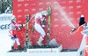 2nd placed Elisabeth Goergl of Austria ( L ), 1st placed Lindsey Vonn of the USA ( C ) and 3rd placed Daniela Merighetti of Italy ( R ) Celebrate on Podium during the award ceremony for the ladies Downhill of the Cortina FIS Ski Alpine World Cup at the Olympia delle Tofane course in Cortina d Ampezzo, Italy on 2015/01/18.
