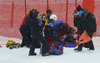 Marc Gisin of Switzerland getting treatment after his crash in the men super-g race of Audi FIS Alpine skiing World cup in Kitzbuehel, Austria. Men super-g race of Audi FIS Alpine skiing World cup season 2014-2015, was held on Friday, 23rd of January 2015 on Hahnenkamm course in Kitzbuehel, Austria
